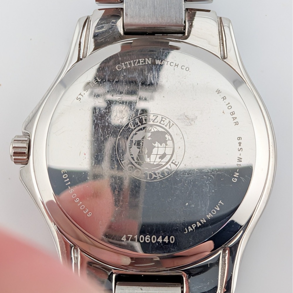 Citizen Eco-Drive Silhouette Sport White Dial Date Watch E011-S091039 Links - Picture 5 of 11